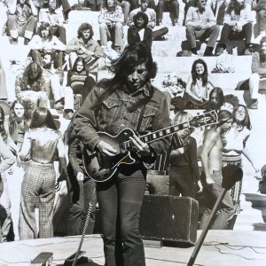 Jesse Ed Davis Playing Slide Guitar, Santa Monica City College Amphitheater, 1973.
Photo by Howard Tsukamoto. Courtesy of Bob Tsukamoto.