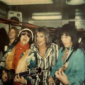 The Faces (left to right: Bobby Daniels, Ronnie Wood, Rod Stewart, Jesse Ed Davis)
Backstage at Concert, 1975. Photo by Patti Daley. Patti Daley Collection.